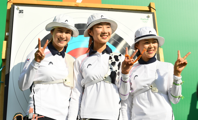 The South Korean squad all matched; Photo Credit: Paul Gilham/Getty Images